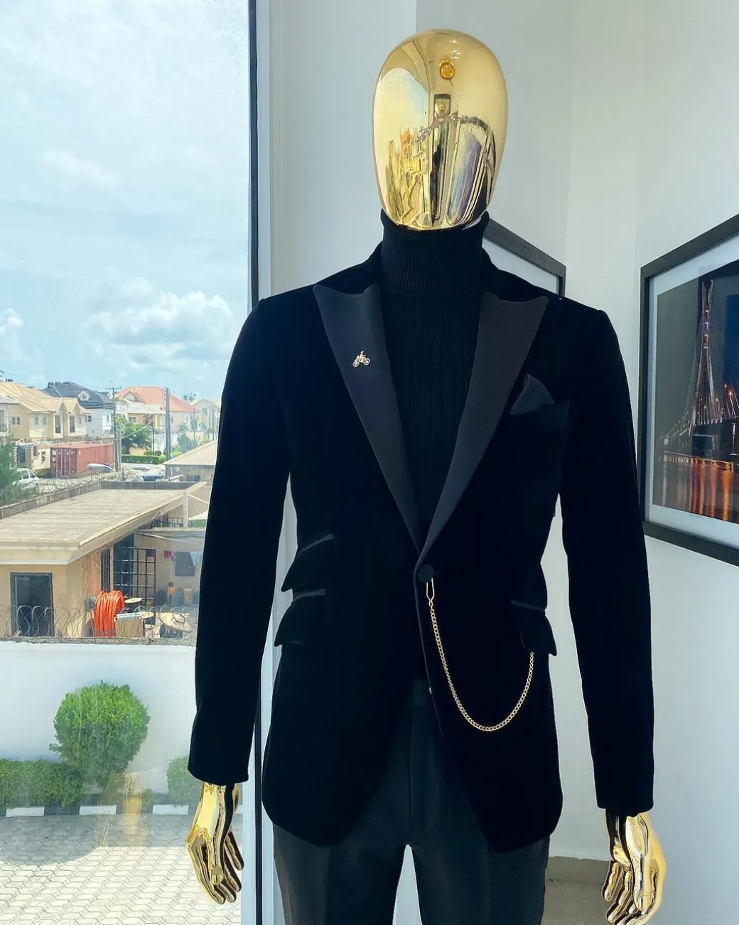A charcoal black peak lapel soaked Italian velvet tuxedo suit