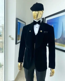 A charcoal black “peaky blinders” soaked Italian velvet shawl lapel tuxedo suit