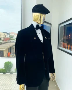A charcoal black “peaky blinders” soaked Italian velvet shawl lapel tuxedo suit