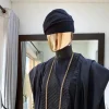 A Charcoal black plain hand knitted Yoruba traditional hat/Fila.