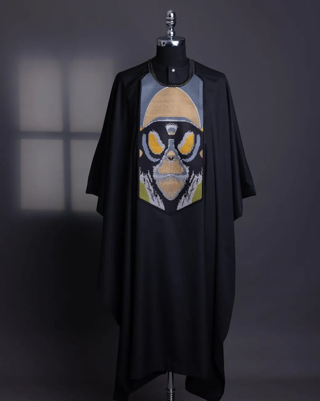A charcoal black, “Planet Of Apes” embroidery Agbada