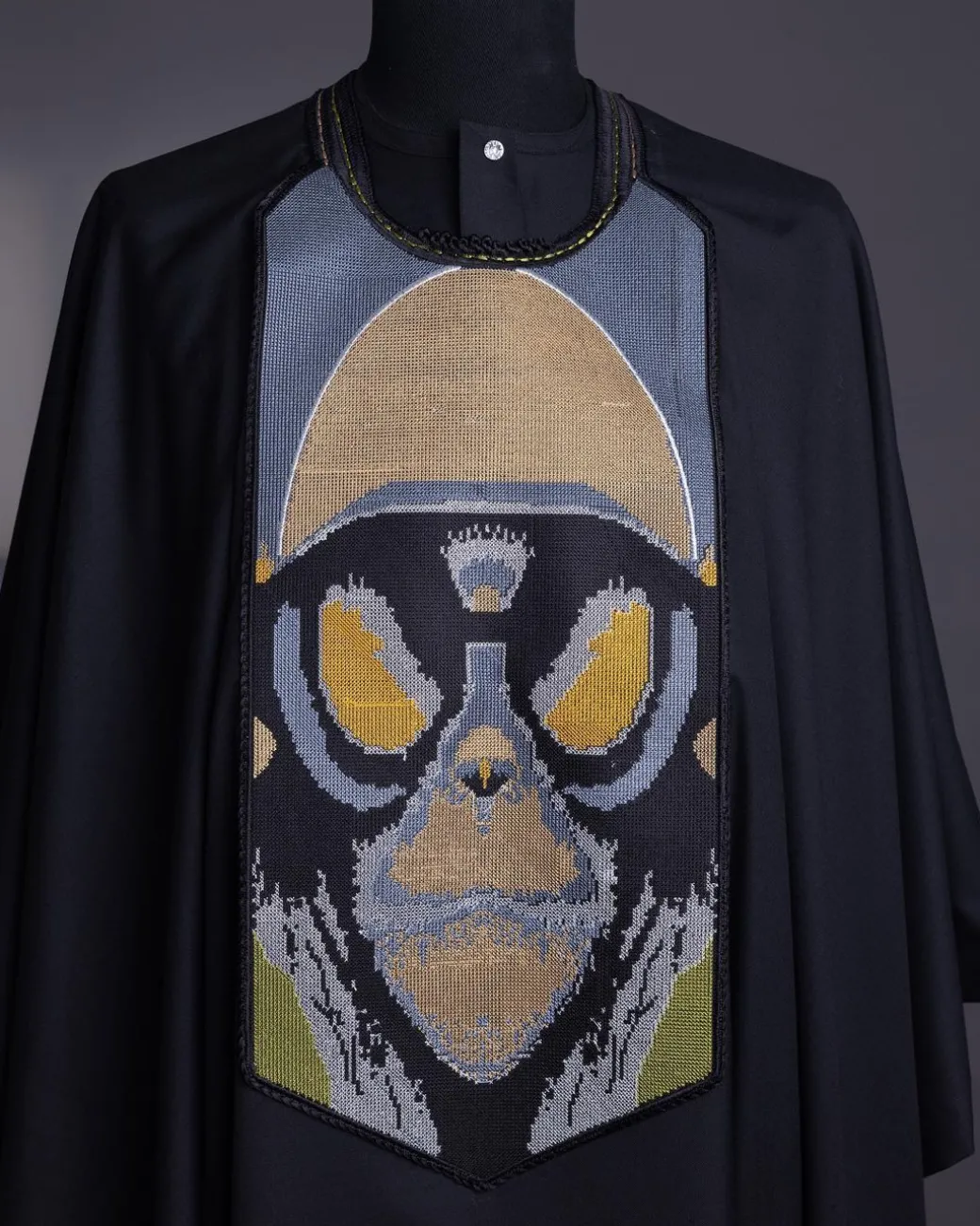 A charcoal black, “Planet Of Apes” embroidery Agbada