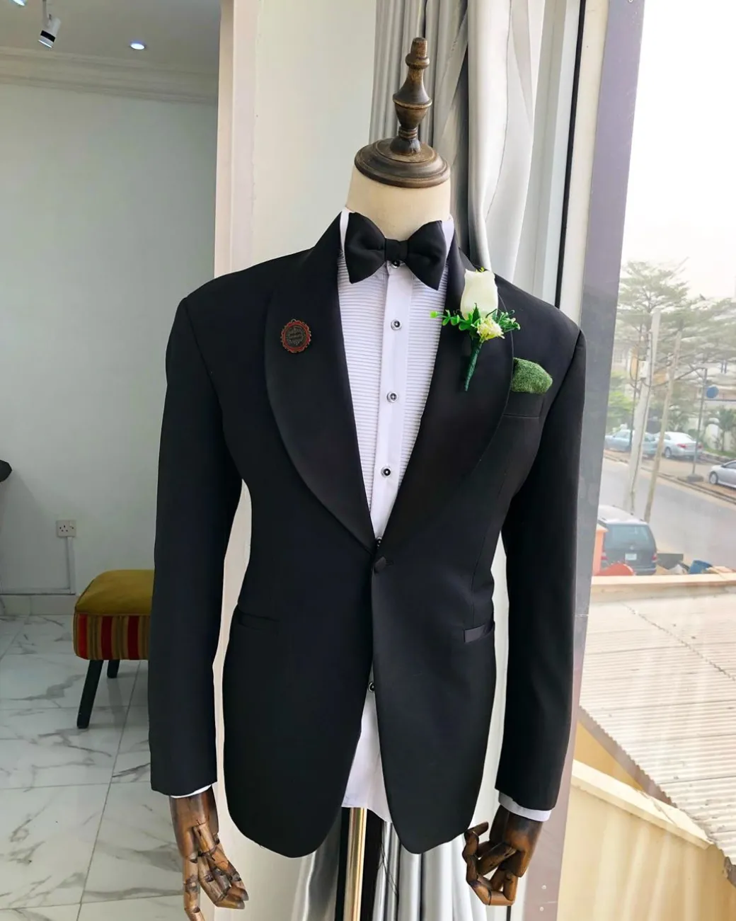 A Charcoal Black Shawl Lapel Tuxedo Suit.