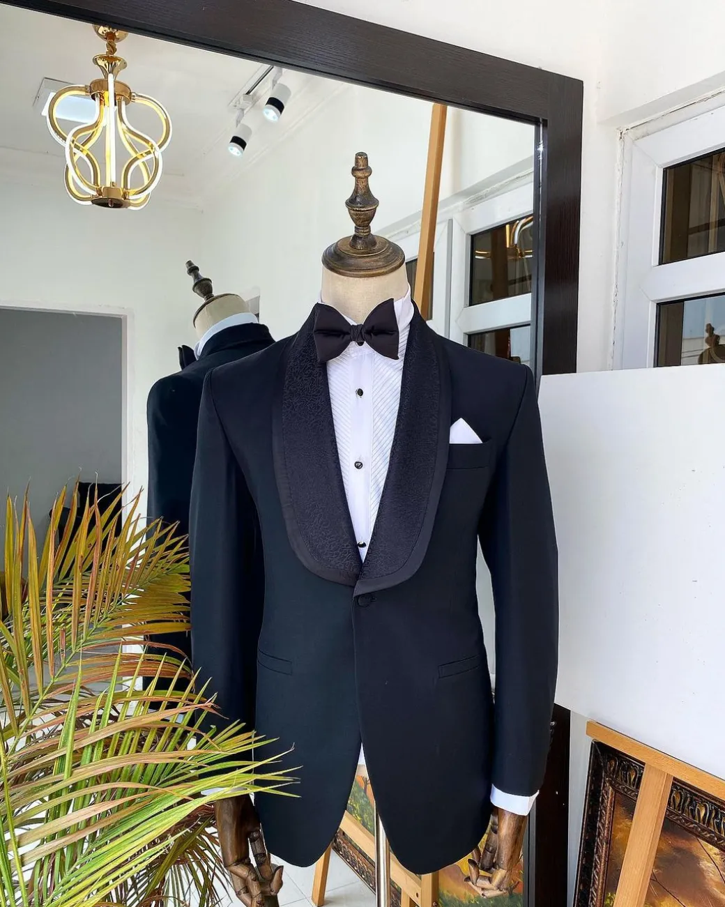 A Charcoal black Shawl lapel tuxedo suit with black jacquard detailing