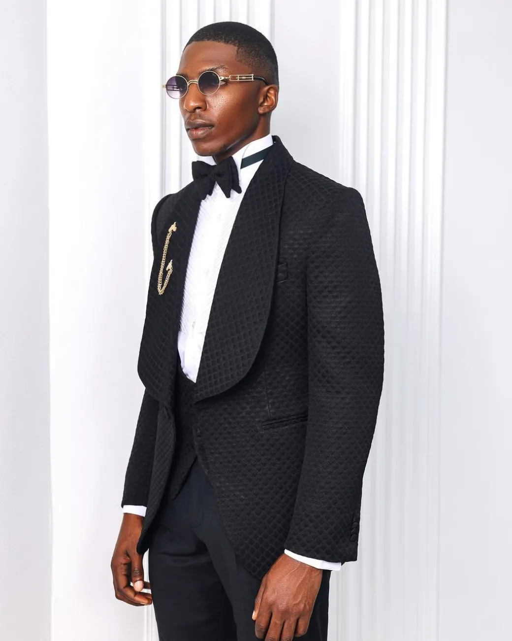 A Charcoal Black, Square Patterned jacquard shawl lapel tuxedo suit