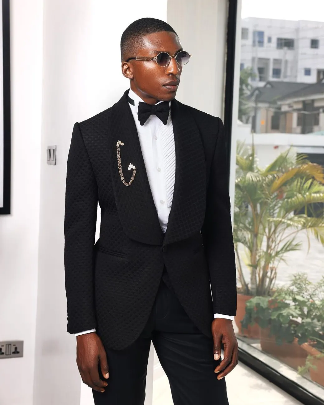 A Charcoal Black, Square Patterned jacquard shawl lapel tuxedo suit