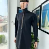 A charcoal black, starkled connected rectangle embroidery detailing African traditional kaftan, fila and Sokoto