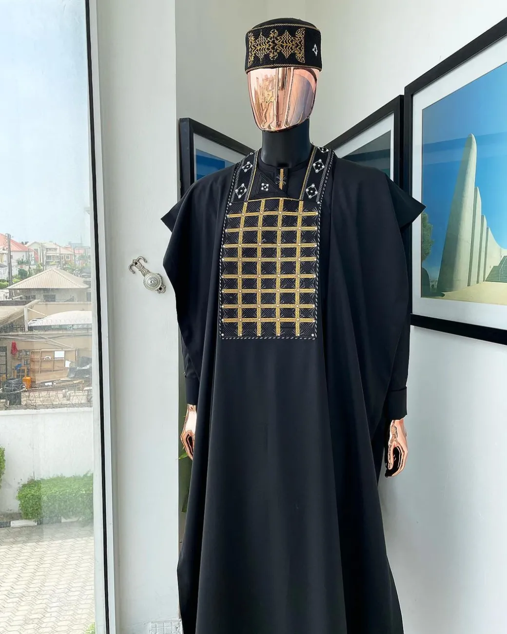 A charcoal black startled connected rectangle, with ss30 light topaz Swarovski crystal detailing agbada