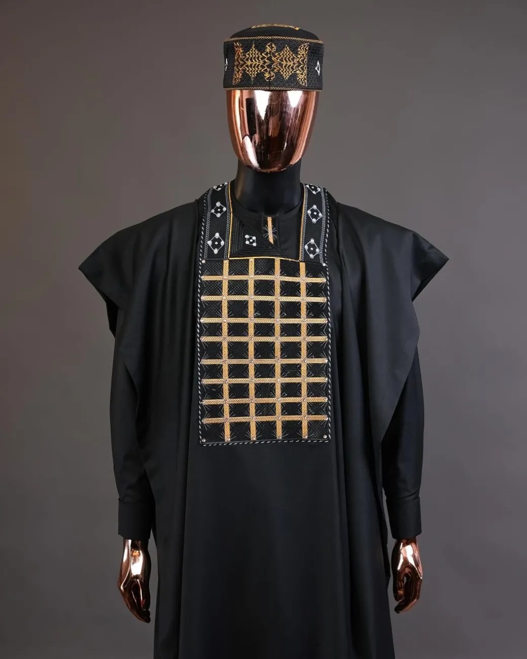 A charcoal black startled connected rectangle, with ss30 light topaz Swarovski crystal detailing agbada