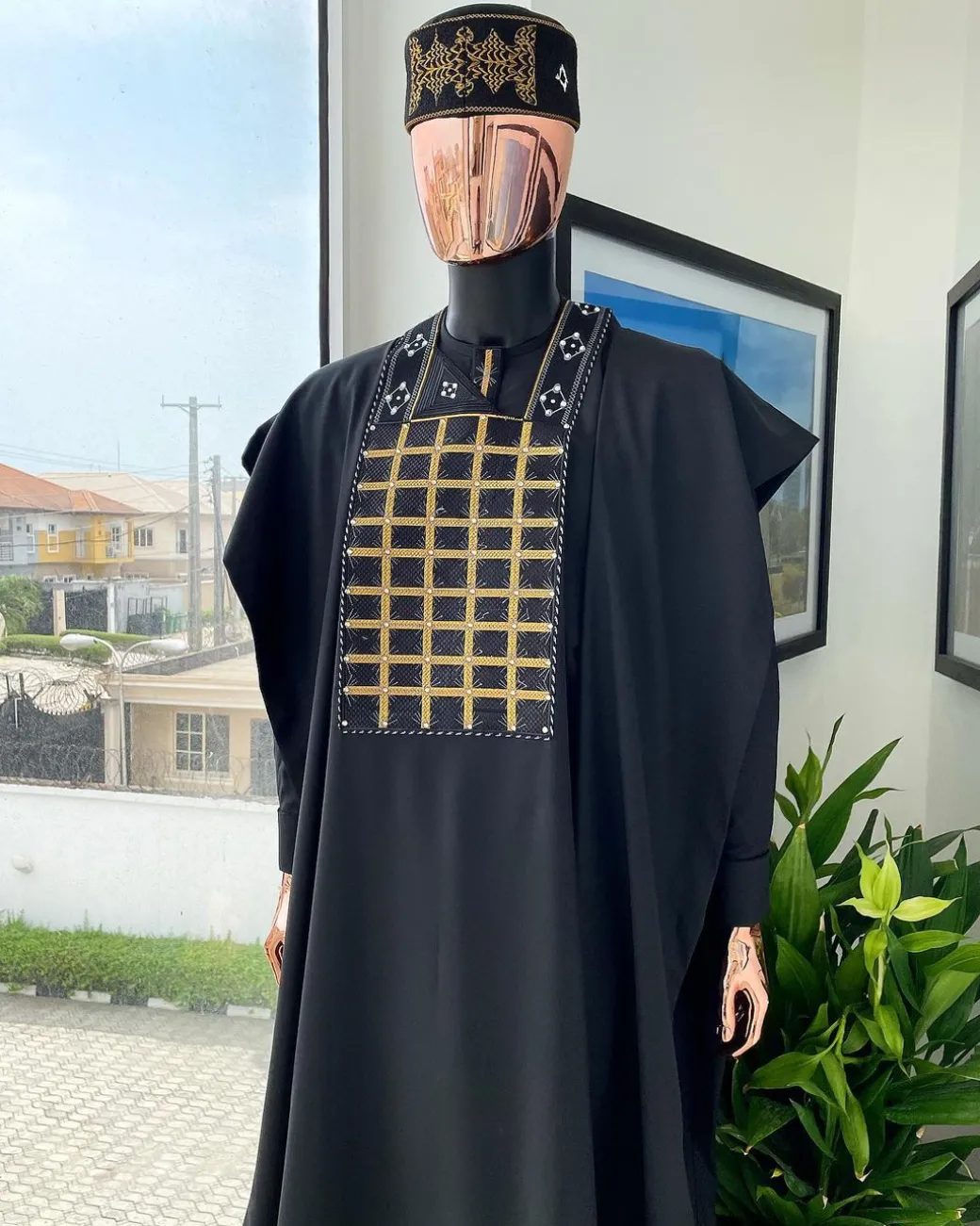 A charcoal black startled connected rectangle, with ss30 light topaz Swarovski crystal detailing agbada