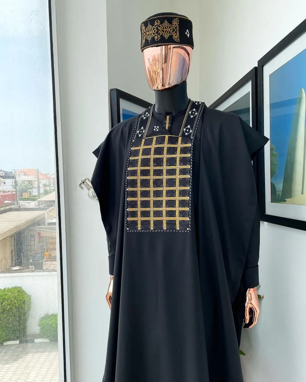 A charcoal black startled connected rectangle, with ss30 light topaz Swarovski crystal detailing agbada