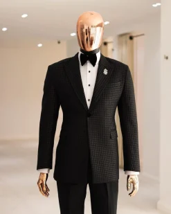 A Charcoal Black, stuffed/slanted Square Patterned jacquard peak lapel tuxedo suit