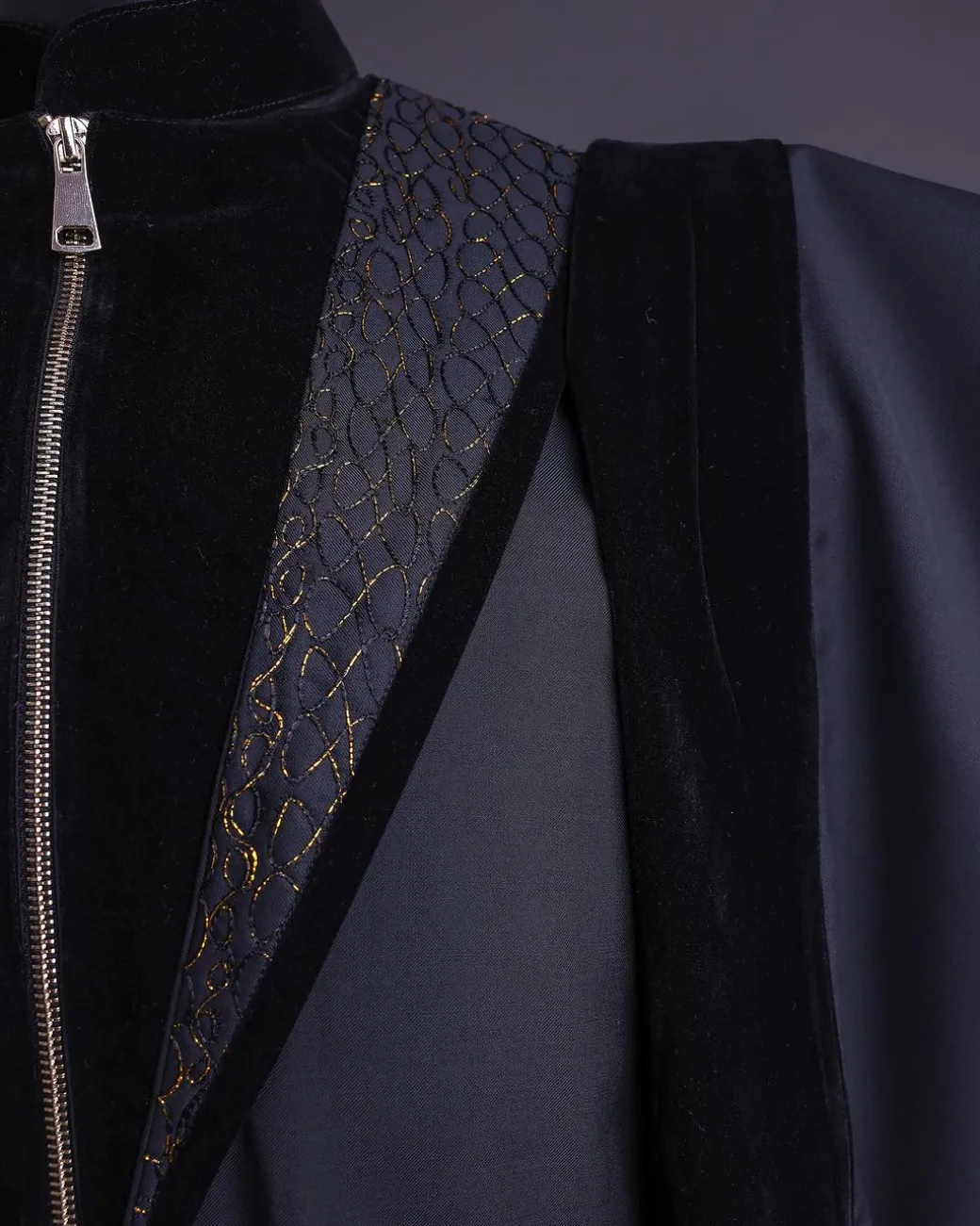 A Charcoal Black, Vehicular Lapelled with Zip Line Flap & Velvet Mix Embroidery Design Details Agbada.