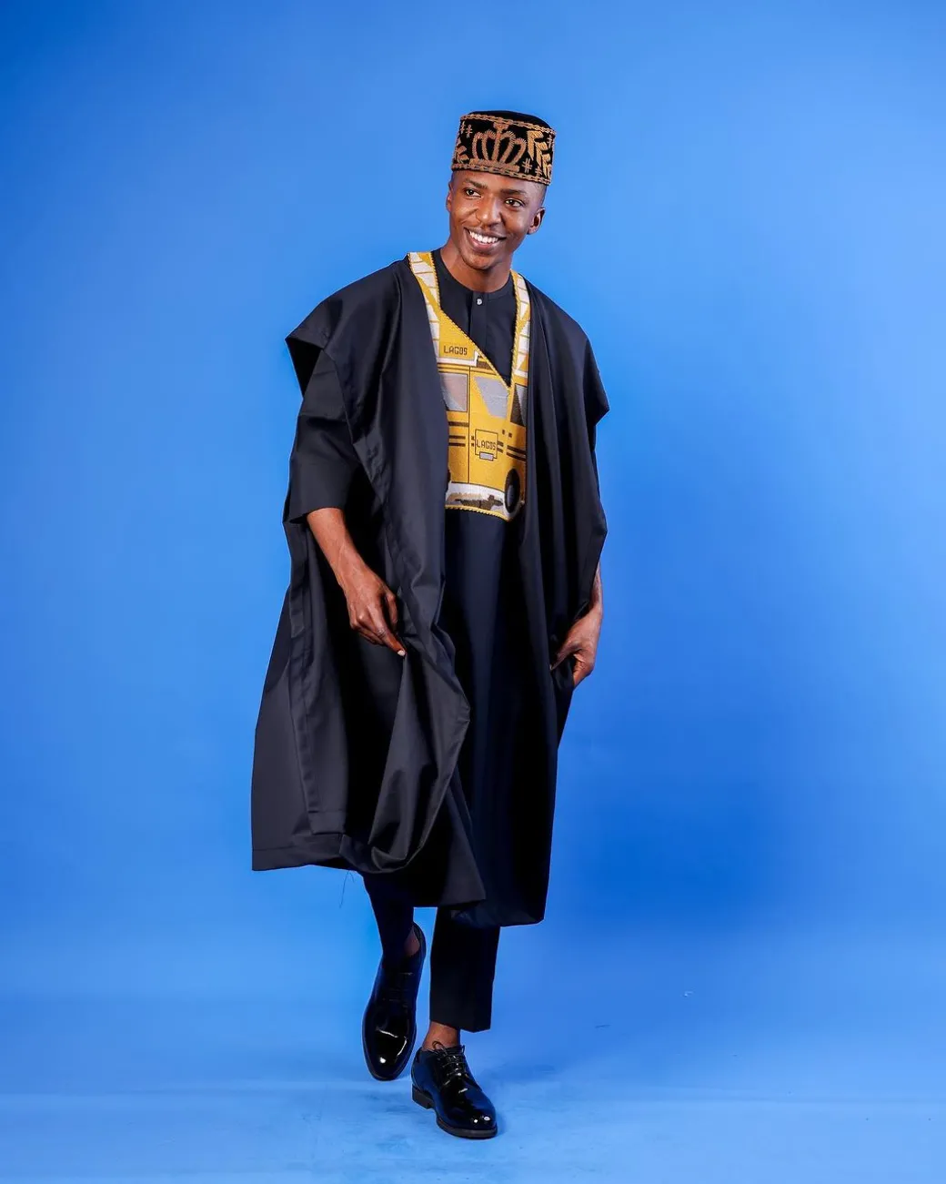 A Charcoal black, yellow danfo embroidery details agbada
