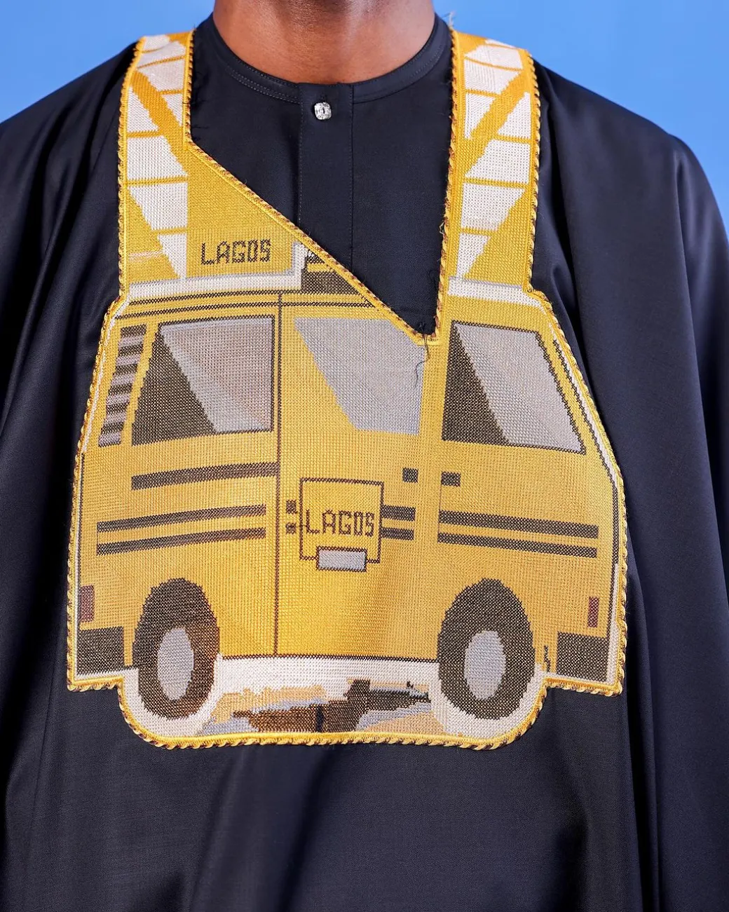 A Charcoal black, yellow danfo embroidery details agbada