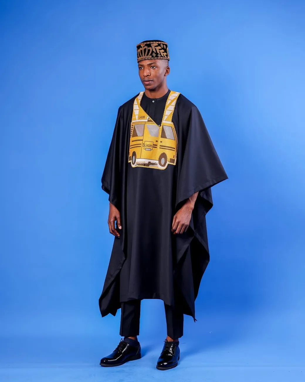 A Charcoal black, yellow danfo embroidery details agbada