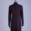 A Checkered black and burgundy with black Swarovski button detailing kaftan and sokoto