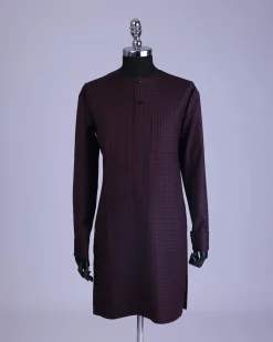A Checkered black and burgundy with black Swarovski button detailing kaftan and sokoto