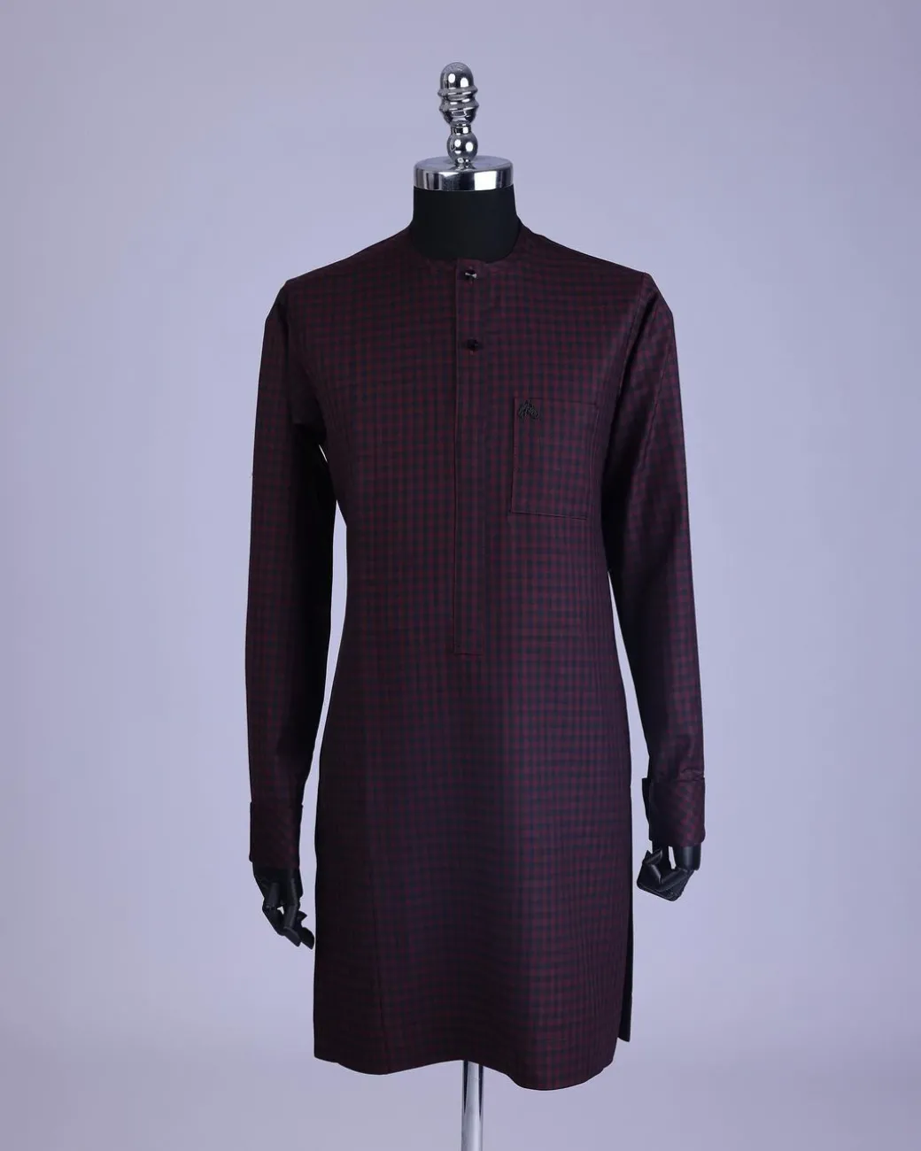 A Checkered black and burgundy with black Swarovski button detailing kaftan and sokoto