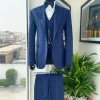 A checkered pattern, peak lapel, 2 button suit