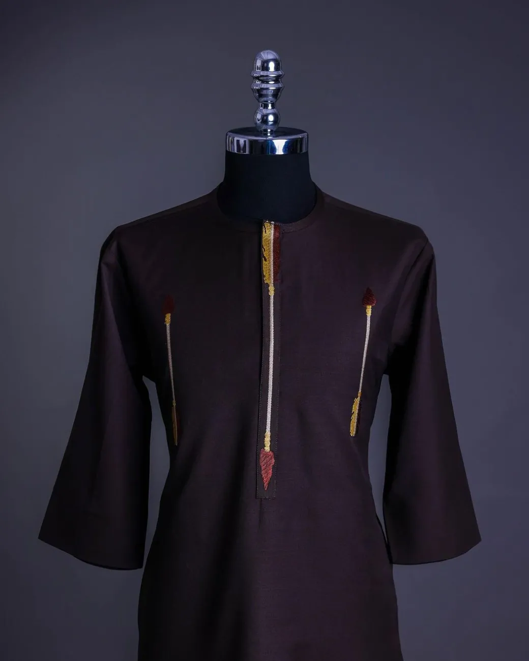 A Chocolate brown, 3/4 sleeve, aborigines arrow embroidery details African senator Kaftan native