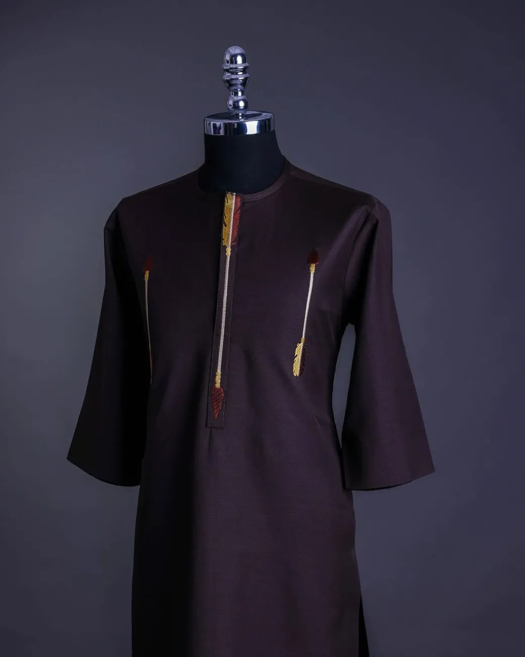 A Chocolate brown, 3/4 sleeve, aborigines arrow embroidery details African senator Kaftan native
