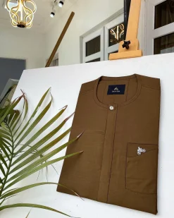 A Chocolate brown African kaftan with a clear view Swarovski button and sokoto