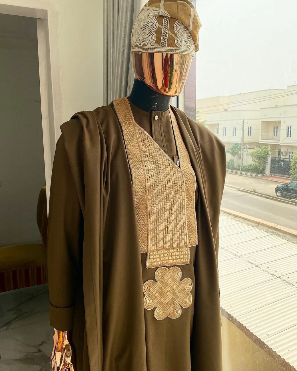 A Chocolate Brown with connected embroidery Agbada