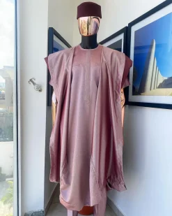 A classic light burgundy “kagbada”, Senator kaftan, burgundy round hat And sokoto