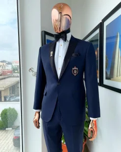 A Classic Navy Blue, Peak Lapel Tuxedo Suit