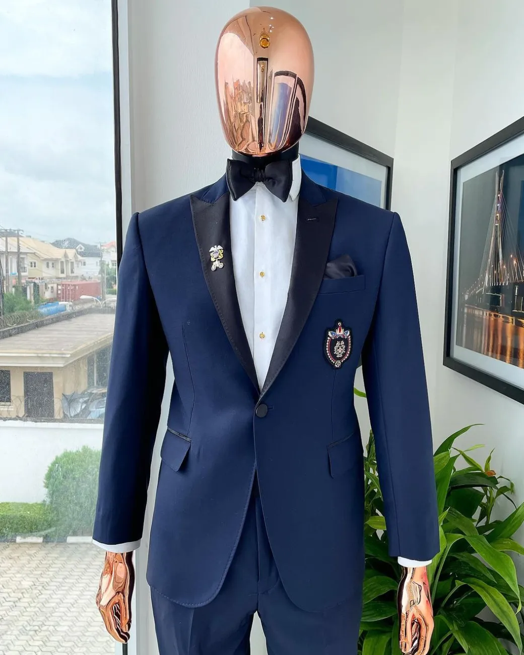 A Classic Navy Blue, Peak Lapel Tuxedo Suit