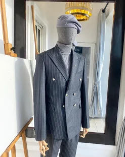 A Classic Peak Lapel Grey Pin Stripe Double Breasted Suit