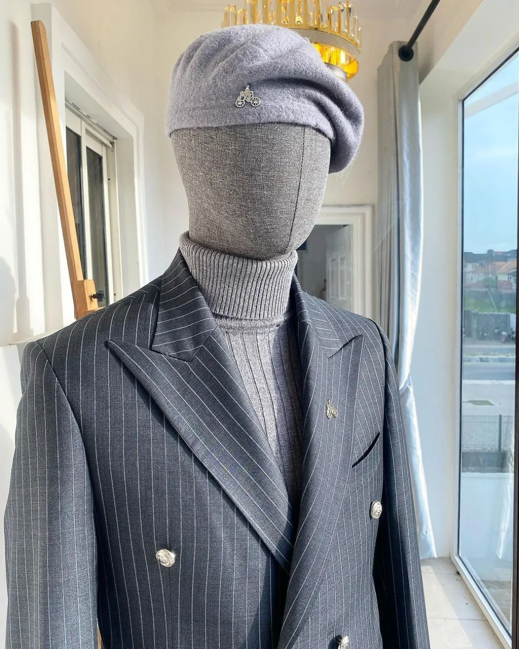 A Classic Peak Lapel Grey Pin Stripe Double Breasted Suit