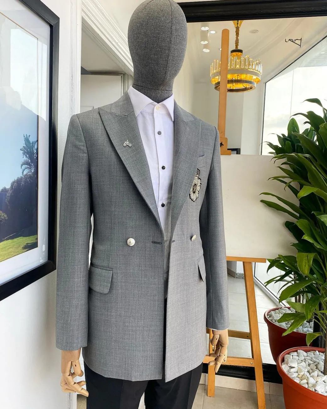 A Cloud Grey Peak Lapel, One button Double Breasted Suit.