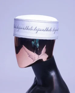 A cocaine white grey scritto pattered embroidery hat