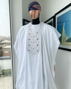 A Cocaine white, Square dropping-layered embroidery design details agbada