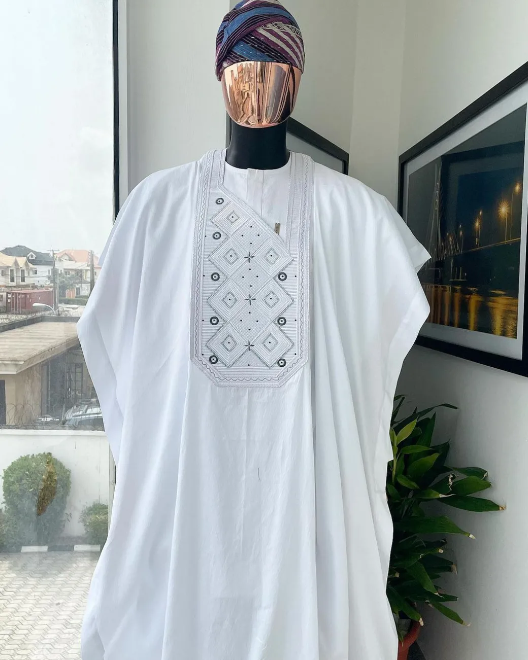 A Cocaine white, Square dropping-layered embroidery design details agbada
