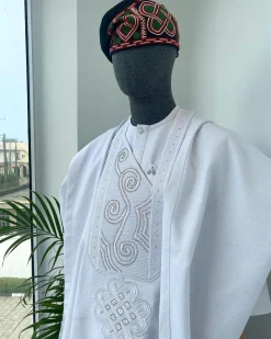 A Cocaine white with a floral Japanese intersection design with Swarovski stone detailing Agbada