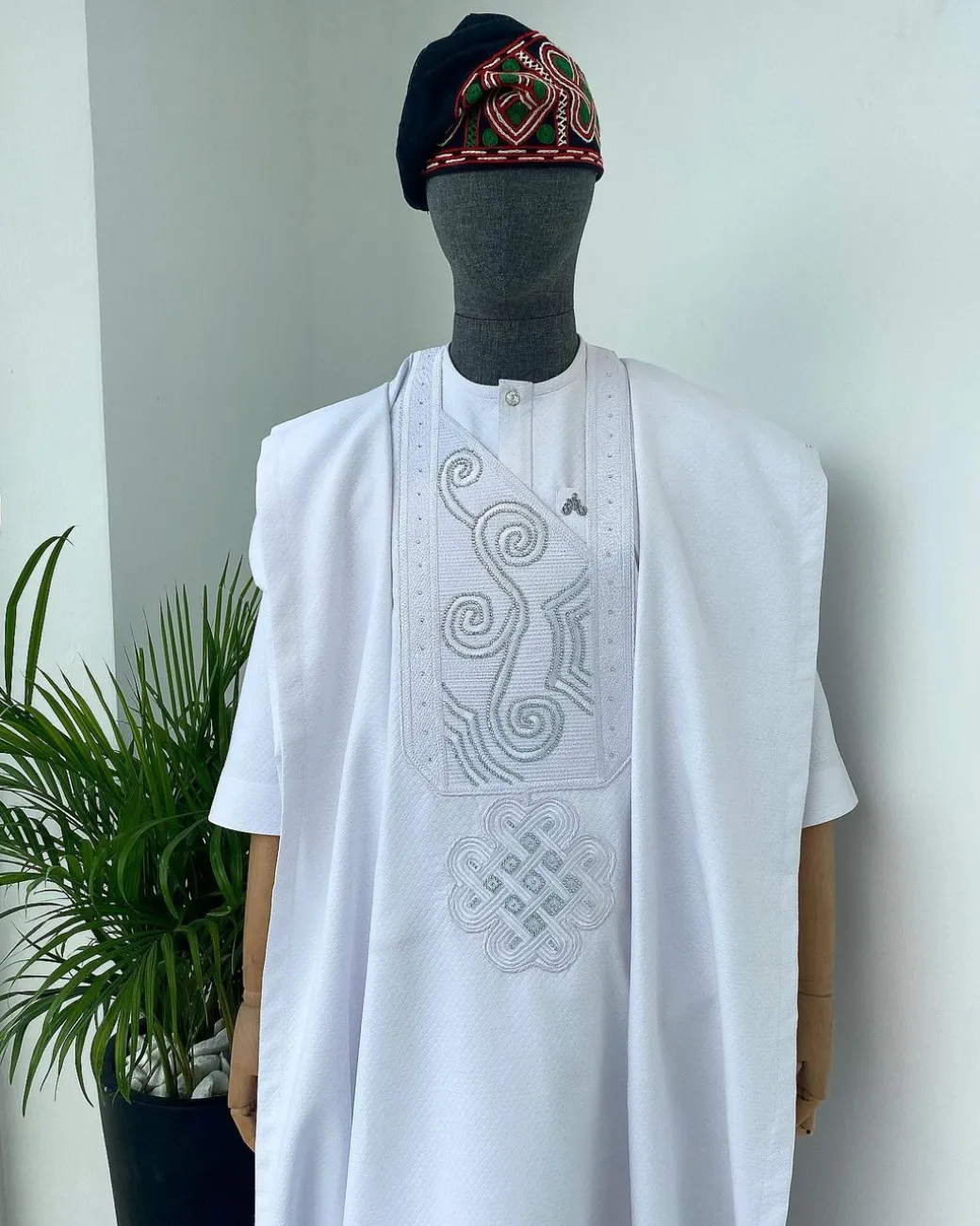 A Cocaine white with a floral Japanese intersection design with Swarovski stone detailing Agbada