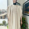 A coconut ivory, jakan design agbada, 3/4 sleeve buba laced with Swarovski stone button details and sokoto
