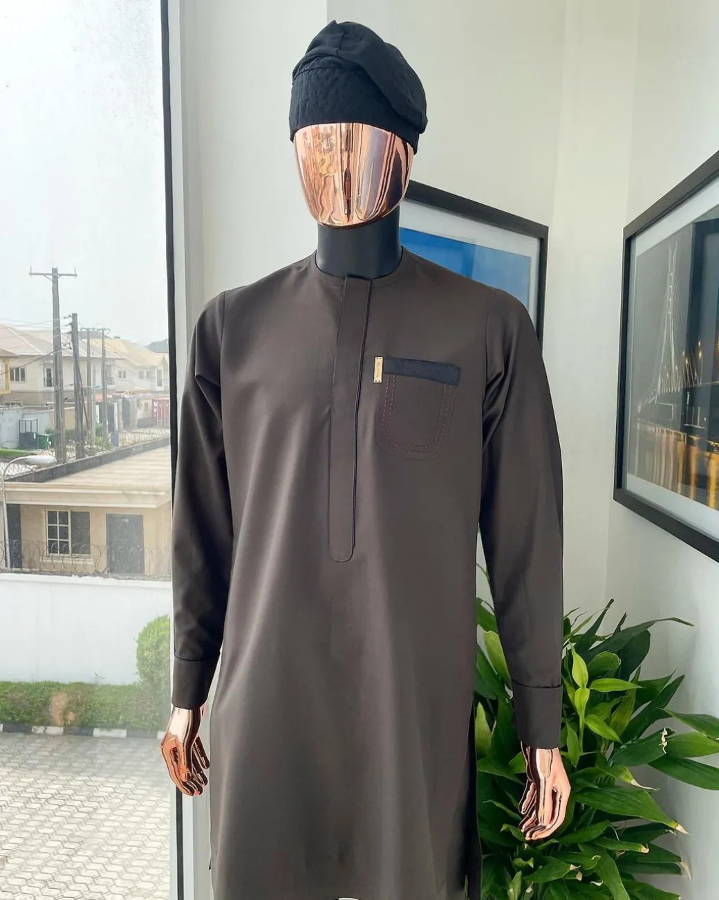 A Coffee brown front flap with black paisley pocket detailing African traditional senator Kaftan native