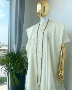 A cream African Agbada with interwoven embroidery design, short sleeve senator kaftan and sokoto