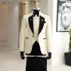A Cream white, dotted square pattern jacquard notch lapel tuxedo suit.