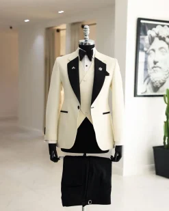 A Cream white, dotted square pattern jacquard notch lapel tuxedo suit.
