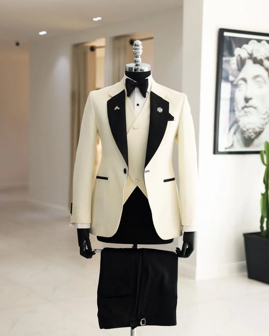 A Cream white, dotted square pattern jacquard notch lapel tuxedo suit.