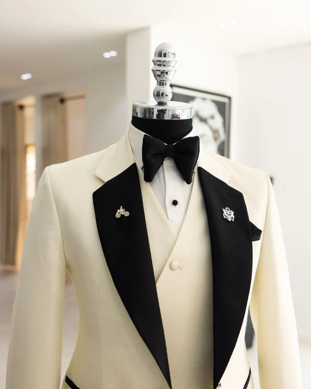 A Cream white, dotted square pattern jacquard notch lapel tuxedo suit.