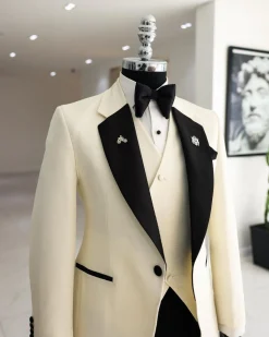 A Cream white, dotted square pattern jacquard notch lapel tuxedo suit.