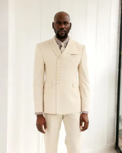A Cream White, Wrap, Peak Lapel Jacket & Pant Trousers.