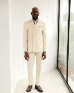 A Cream White, Wrap, Peak Lapel Jacket & Pant Trousers.