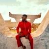 A Crimson red, peak lapel, single button wrap suit